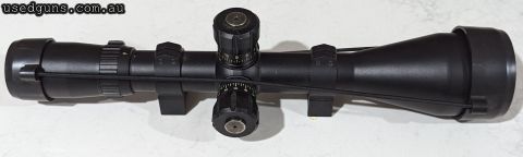 Bushnell Elite Tactical 6-24x50 mil dot reticle SFP MOA scope with scope rings. Model ET6245.