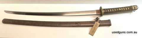 WW2 Japanese officer grade katana in good condition, signed blade, original surrender tag still present( Japanese soldiers hoped their weapons would be returned