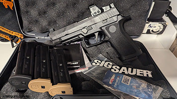 Sig Sauer RXP X-Frame Full size adorned with the Sig Sauer Romeo Pro 1 red dot and cased with 4 mags and all the manuals, locks and stickers from new. The pisto