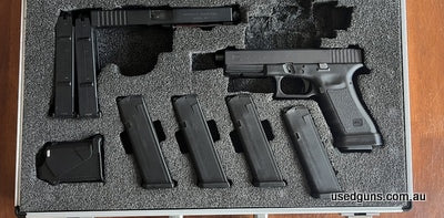 Regretful sale. Only selling as getting out of the sport. Gen 3 Glock 17 with 5 ten round magazines and Tacsol .22lr conversion slide with two ten round magazin