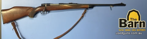 Sweedish made Husqvarna 243W. Control round feed action, open sights. Beautiful rifle that has some cosmetic marks. Hinged floor plate, Jewelled bolt, drilled a