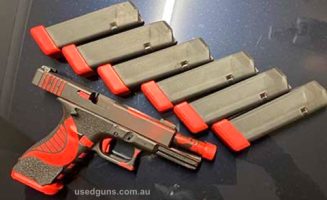 Glock with six mags, gemtec threaded barrel, magwell, g34 slide release, one of kind cerakote Gi Joe cobra ninja.