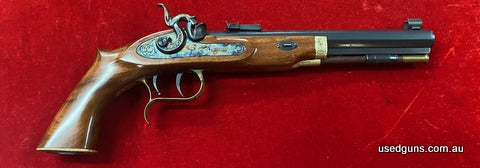 Thompson Patriot 45 BP target pistol 9 inch barrel. Part engraved. Set triggers. Firearm unfired