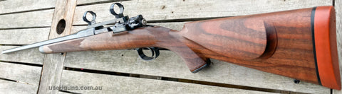 Custom built Belgium Mauser 98, with engraved floor plate, trigger guard & pistol grip cap, fitted with custom bolt & timney trigger. As far as i know this rifl