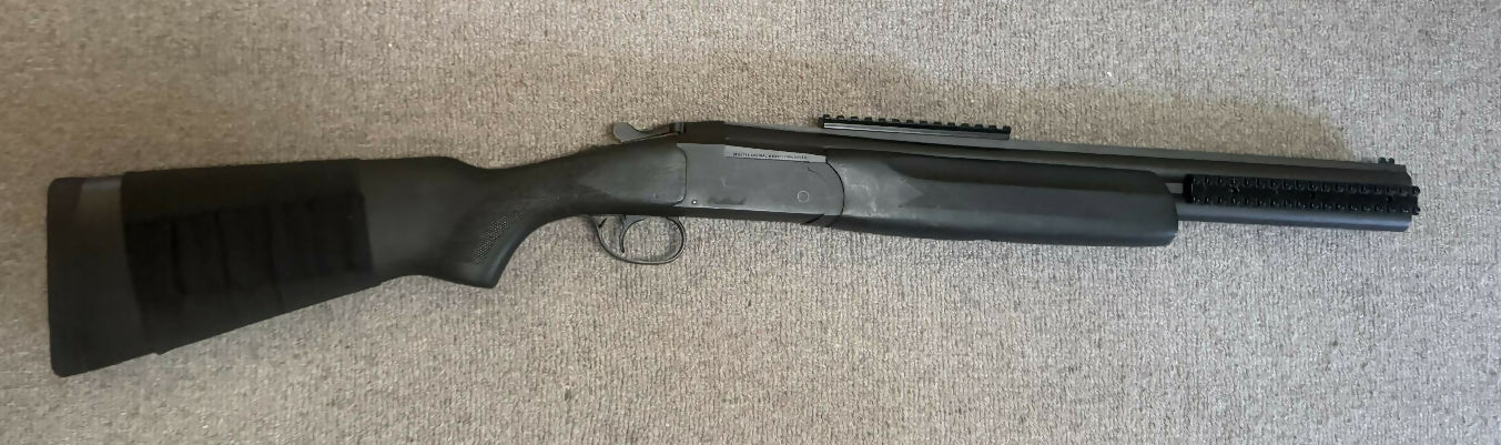 The Stoeger Outback Tactical 12ga is a compact, rugged break-action over-and-under utility shotgun. It features 20-inch barrels, 3-inch chambers, and practical 