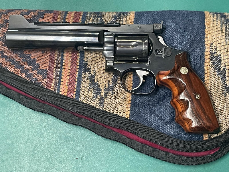 S&W Model 19-3 .357 Mag six shot with recessed cylinders, fully customised by pistolsmith with a new 6” target bull barrel and three position Aristocrat sights.