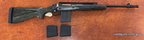 Like New Ruger Gunsite Scout chambered in 308W. Green Laminated Stock and comes with two magazines. Hardly used, excellent condition .