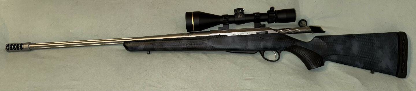 Tikka T3X 270w Pollyfade stainless fluted with spiral fluted bolt - tt muzzle break, limbsaver recoil pad, talley rings, leupold VX3 HD