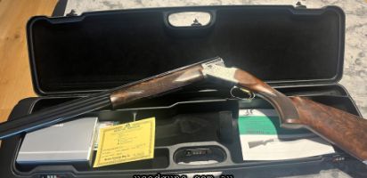 Excellent 20 Gauge only used a couple of times, comes with Grade 5 timber, 5 chokes and Mirkou original hardcase.