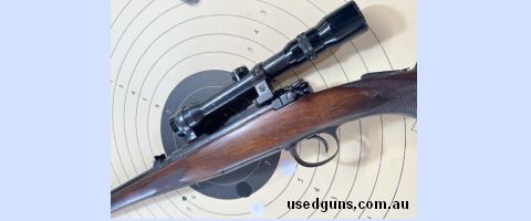 Model 1910 ( 375 EX)Takedown with rare factory pop up peep sight in wrist. Stock has been expertly reparired through the wrist, thus the price. Complete with pe