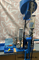 Dillon 650 reloading press, older model in good working order. Case feeder, roller handle. Dies include 9mm/38 super, 38 special/357, 45 colt. Shell plates, bra