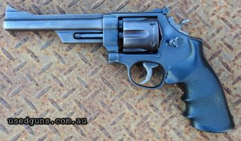 Nice & big, satin finish with Hogue grips. Some storage marks & scratches. Good solid revolver. $25 Express Dealer delivery (Not WA). 2 photos available.