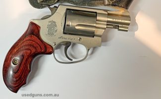 Good condition shoots very well, lovely wood grips , comes with a leather ankle holster, nickel plating son the s&W logo lifted off , rest is in good condition