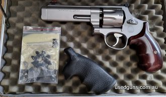 627 V-comp 8-shots 357 Mag/38 Special from S&W Performance Centre Custom full internal polish and trigger job, extended firing pin, bobbed hammer, lock removed 
