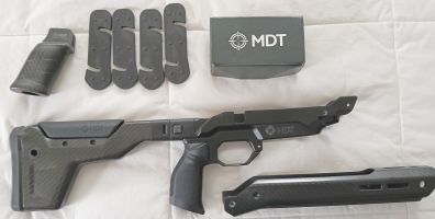 MDT HNT26 Remington 700 SA Folding ARCA rail Carbon fiber Chassis. The chassis has been pinned for NSW but can be easily changed back to a folding stock. V-Bloc