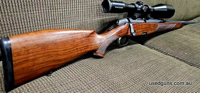 Steyr 223 Classic Lite. Beautiful walnut stock with stunning checkering. 22 inch fluted barrel. Fitted with Schmidt Bender 8x 56 scope. Rifle is set up for daug