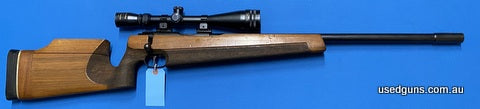 Excellent condition Walther Target rifle in 22LR. Has a Target Master 6-12x44 mounted. Ergonomic stock. Cycles well. Barrel very good. Great bench 22.