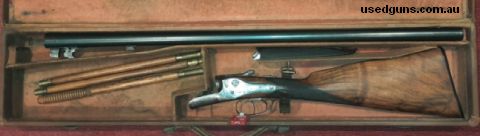 Dated by serial number to manufacture in 1879, so made for black powder 12G 2 1/2 inch shells. The "crystal indicator" was a small window in each lock plate to 