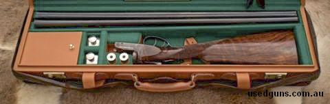 Stock is a Geoff Slee left hand in exhibition grade walnut with checked butt, LOP 373mm to front trigger. Original factory right hand stock available. Cased in 