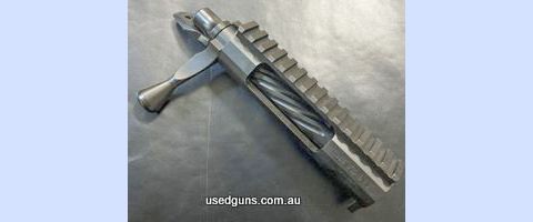 Defiance Deviant Tactical, Serial# HA0347. Right Bolt, Right Port, Short Action. Plunger Ejector. Detachable (Badger) Magwell Cut. Flat Bolt Nose. Mini 16 Extra