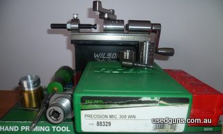 Wilson case trimmer 2 308W case holders, 1 9mm holder, 1 308W Lee collect die, 1 Hornady Cam Lever bullet puller, 1 RCBS 308W Flash Hole Cutter, RCBS hand Primi