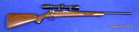 Timber stock, rotary 10 shot magazine,sporter blue barrel