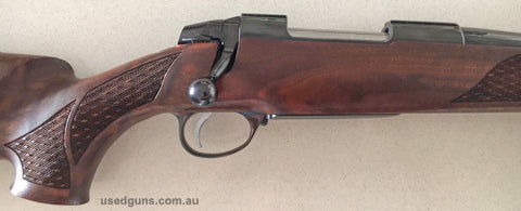 Beautiful Sako 75 Deluxe sporter 22" barrel only sighted in at range no field work, fired 50 rounds of factory ammo barrel 10/10 deep lux blueing, hand skip lin