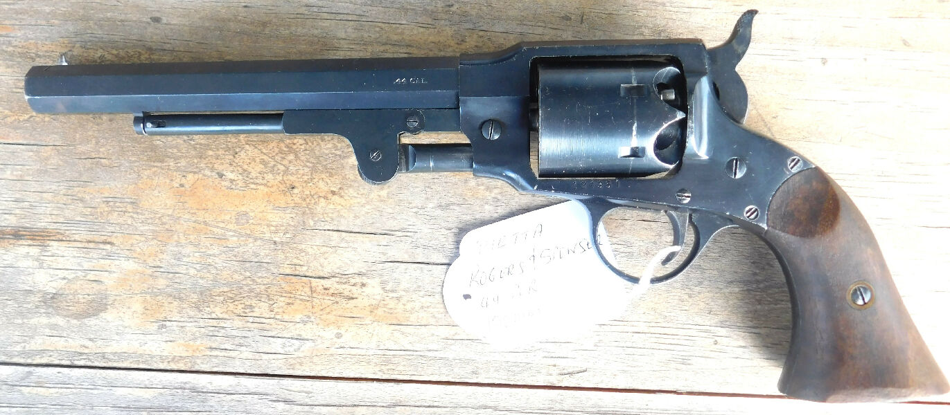 Pietta copy of Civil War era Rogers & Spencer. One nipple removed, cylinder drag ring and grip flares shaved. Very good bore and working order.
