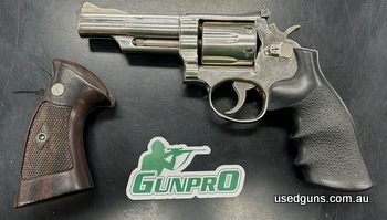 Smith & Wesson Model 19-03. Good condition, comes with timber grips
