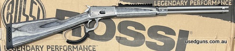 Reduced from $1695 to clear. Rossi 92 Stainless Laminate in 357 Mag. 20 inch barrel with peep sight and scout scope Picatinny rail. $65 freight to your dealer A