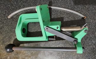 Redding Big Boss press, some surface rust, should clean up with fine steel wool etc but nothing that effects functionality. Works well but I've left the sport. 