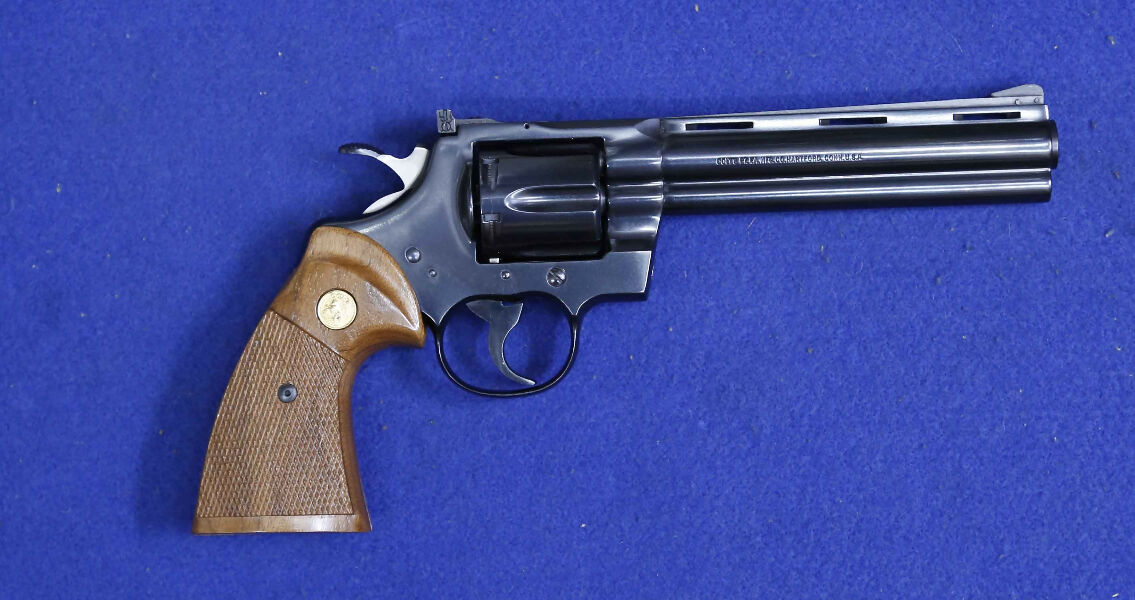 Colt Python 357mag, blue revolver, 6 shot, timber grips, barrel 150mm