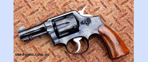 Pre 1947 Smith & Wesson. Beautiful grips, Barrel has been shortened at some stage of its life. Has "United States Property" stamped on frame & P 67564 inside th