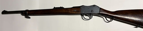 Sleeved barrel, aftermarket front sight. This rifle is either a Cavalry or Artillery Model. "S" stamped on action could indicate sale by the British Government.