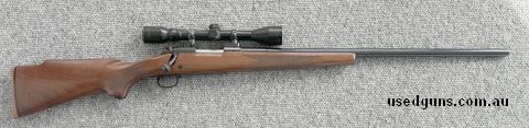 Winchester 70 Sporter in .223 Heavy Barrel, Older push feed model, excellent condition for its age apart from one scratch at the end of the barrel and a small d