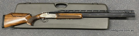 Very good condition Ceasar Guerini Apex AT 12G O/U. 32 inch barrel, high rib, flawless engraving on the action. Immaculate woodwork. Photos speak volumes. Comes
