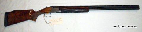 Broadrib trap gun. Right hand.14 3/4 LOP. Very tight lever to the right. Excellent bores. Old school trap gun.
