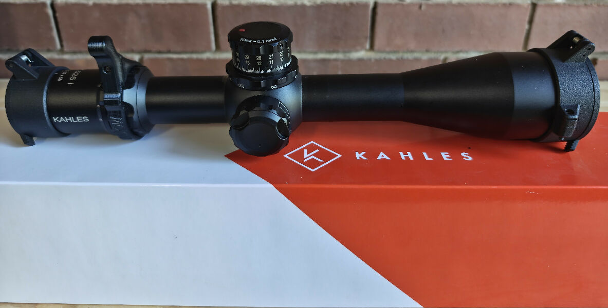 Kahles K525i CCW 5-25X56/SKMR W-left. Scope comes with MK machine works lens cover, throw lever and windage wheel. Scope is in excellent condition and has got m