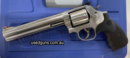 Brand new in the box. Smith and Wesson M686 3-5-7 357 magnum revolver. 7" Barrel, 7 shot unfluted cylinder and Silver/Black wood grips. S&W Model number 150855.