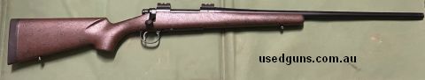 Remington 700 AWR (American Wilderness Rifle), stainless action, black Cerakote finish, 22" stainless 5R barrel 1-10 twist, Graeboe pillar bedded stock, 2 piece