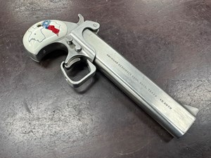 AMERICAN DERRINGER CORP
M-6
TEXAS MODEL 
45ACP
6" BARREL
STAINLESS STEEL
IVOREX GRIPS
#135966

UNFIRED $499