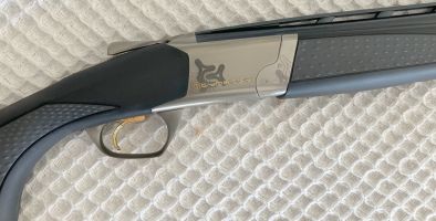 Browning Cynergy Black Ice. 10 shots fired, cleaned and put away.  Cased. 5 Midas Chokes. Excludes transfer fees and charges..