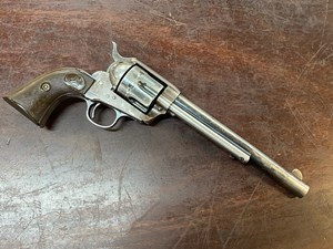 COLT
SAA - SINGLE ACTION ARMY
44-40, 6 SHOT
MANUFACTURED 1904
WITH COLT FACTORY LETTER
MATCHING SERIAL NUMBERS
7 1/2" BARREL
VGC BORE
BARREL STAMPED "COLT FRONTIER SIX SHOOTER"
SOLID TRACES OF ORIGINAL BLUE FINISH
VGC ORIGINAL COLT GRIPS
SOLD TO SEARS IN 1904 ONE OF THE LARGEST
SPORTING 