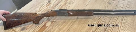 Remington 3200 12 G shotgun. 30 inch flat rib barrel with fixed half an full chokes. The Gun is wearing a Highly figured Monte Carlo 1 in 1000 stock and forend 