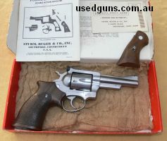 Ruger Security Six .357 stainless steel revolver with 4" barrel. In very good condition and comes with aftermarket medium rubber grip, original grip, original b