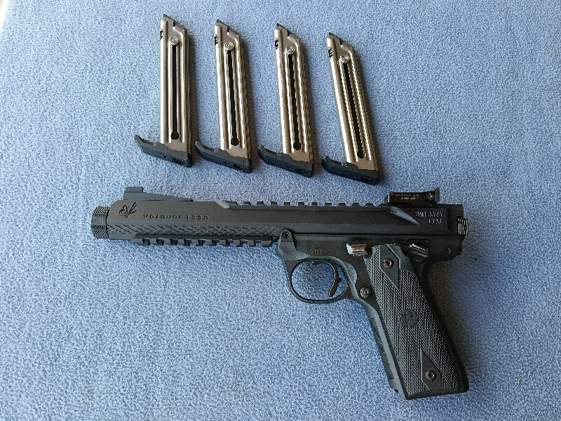 Volquartsen custom 22lr, Volquartsen match grade trigger, target adjustable sights all in near new condition! Comes with 4 mags. Superb accuracy and reliability