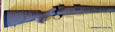 H-S Precision stock, aluminium bedding block. Sporter 22 inch barrel 1 in 8 twist, mini action, cerakoted, low round count.