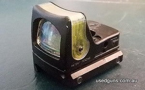 Trijicon RMR for sale. This is the triangle dot model, in amber colour, and is powered by fibreoptics (for day time illumination) and tritium (for night time il