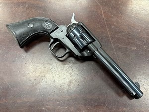 COLT
SINGLE ACTION 
FRONTIER SCOUT
22LR
6 SHOT
123MM BARREL
ORIGINAL COLT 
BLACK CHECKERED GRIPS
#168769F

EXC $690