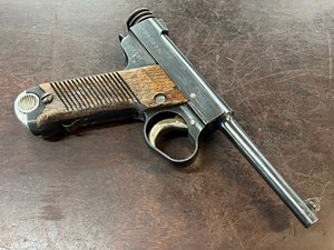 NAMBU
MODEL 14
8MM, 8 SHOT
WWII JAPANESE HADNGUN
EXCELLENT BORE
ORIGINAL TIMBER GRIPS
PRE 46 COLLECTABLE 
16.11 STAMPED 
MANUFACTURED NOVEMBER 1941 
#2435

VGC+ $2290
